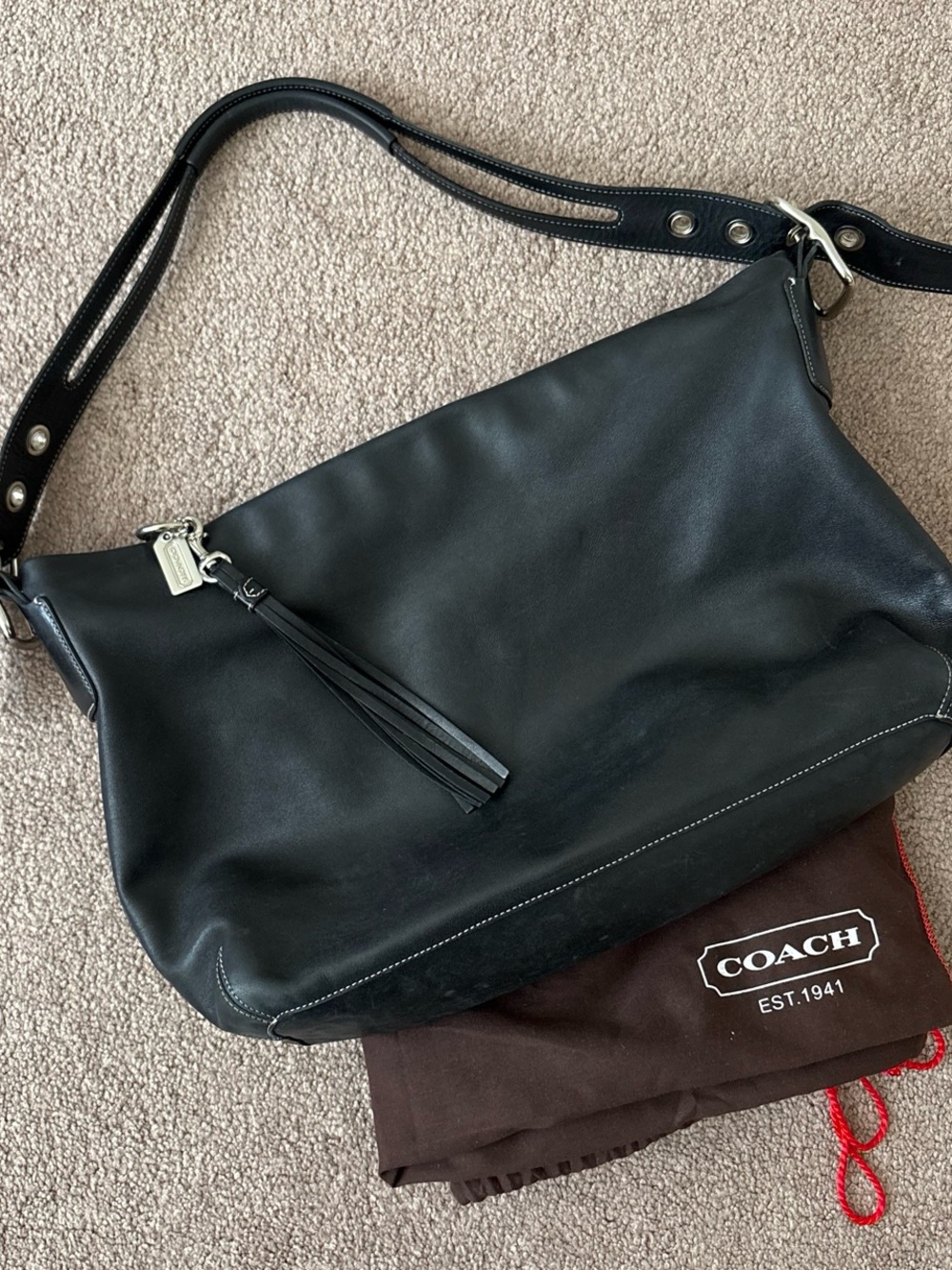 Coach Black Leather Messenger Bag with Tassel